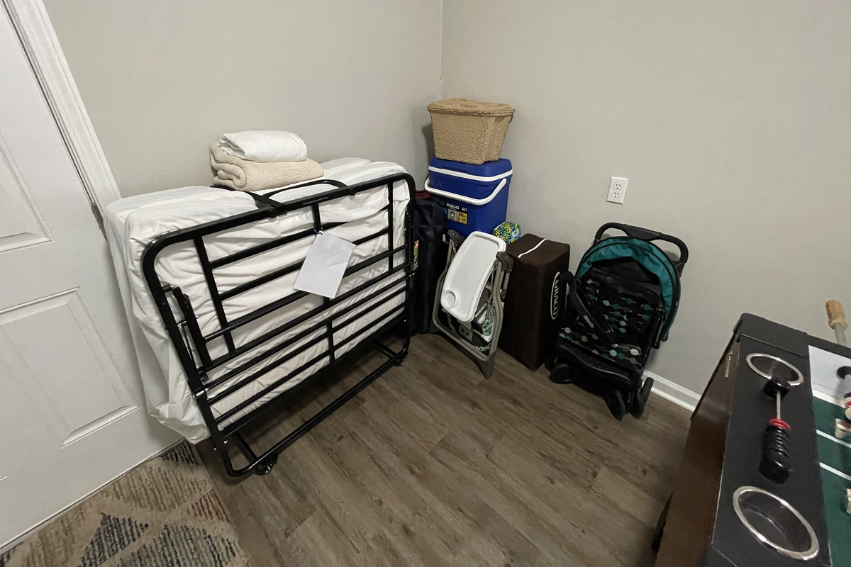 Extra twin fold up bed, coolers, stroller, high chair