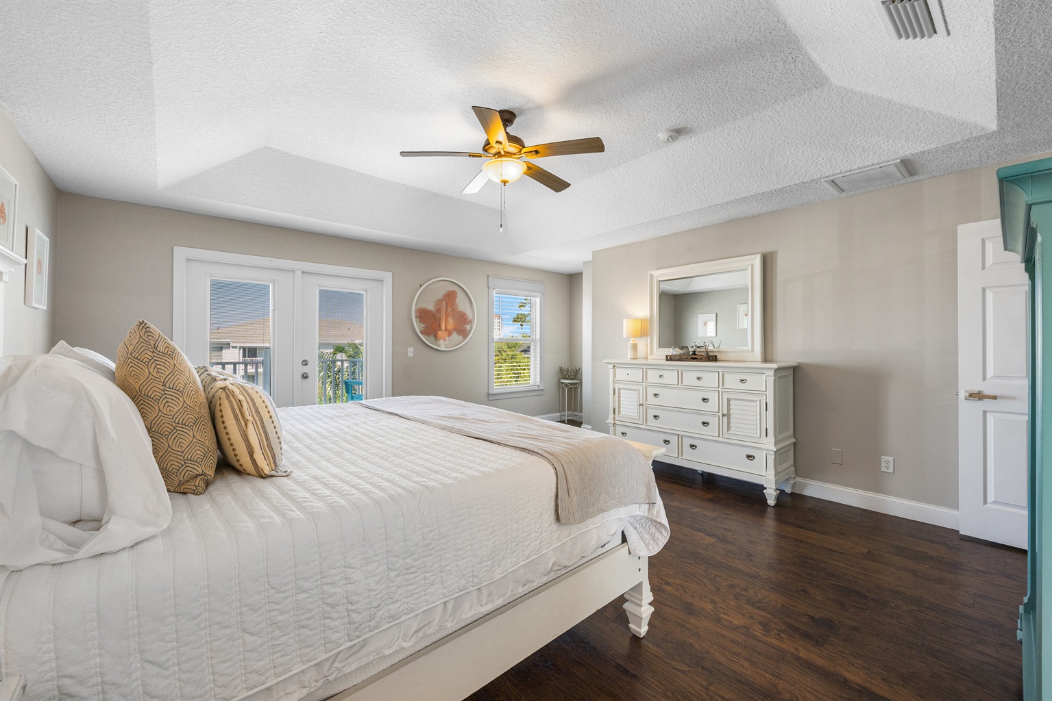 Relaxing master bedroom with king bed and natural light