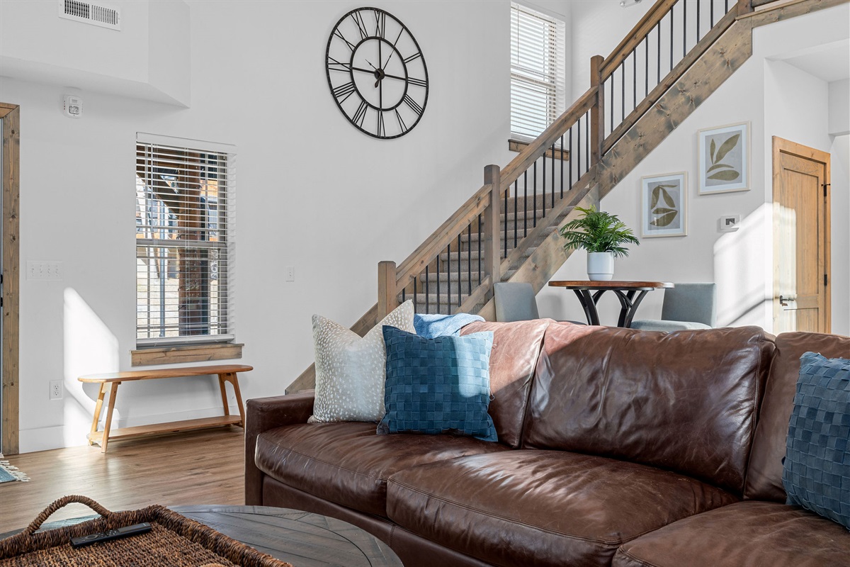 Bright and welcoming gathering space with comfortable seating and an open, airy feel.