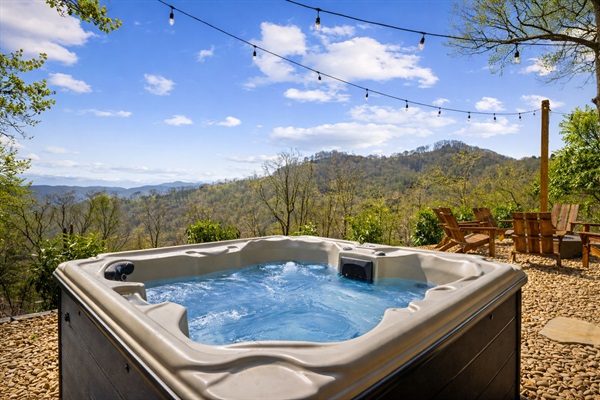 Another view of the hot tub, with mountains stretching beyond—an easy place to relax and take it all in.