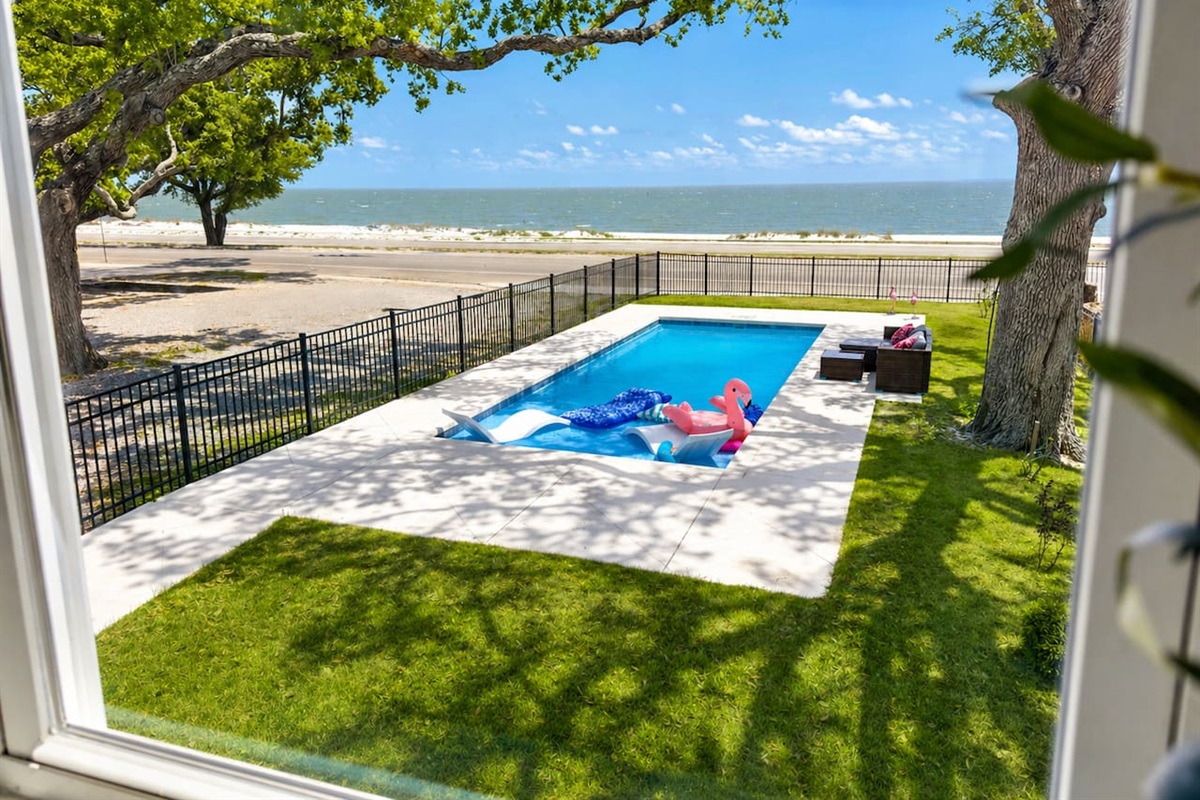 Cool off in the pool with peaceful ocean views all around.