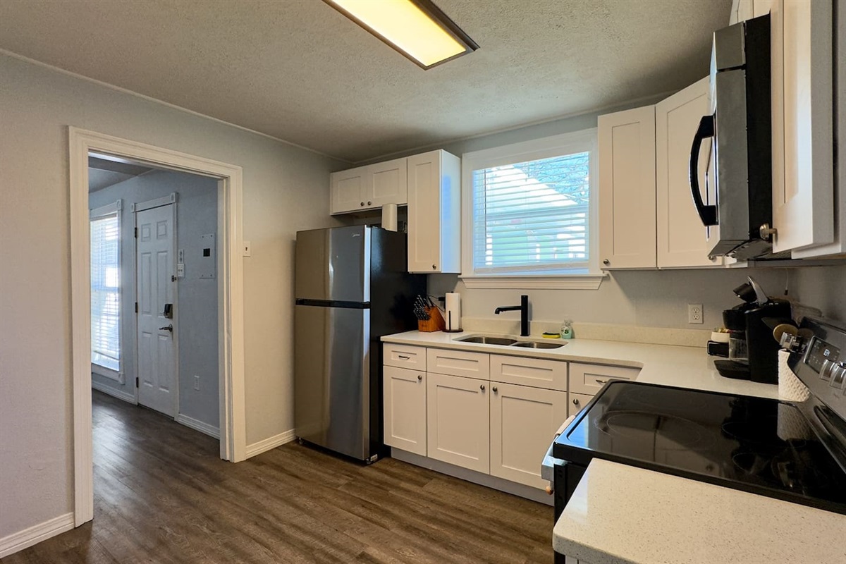 Bright, fully equipped kitchen—perfect for morning coffee or home‑cooked meals