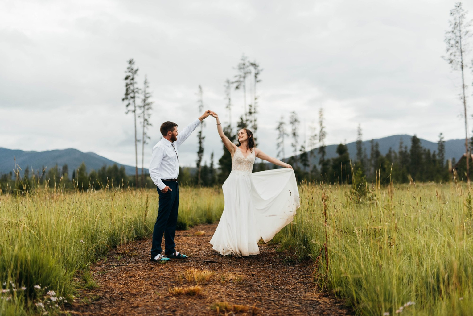 Couple dancing in the meadow at Casa Vista