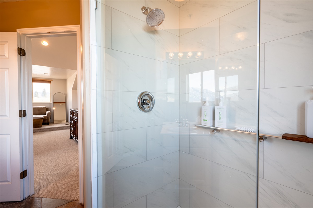 Step into the spacious walk-in shower and unwind after mountain adventures.