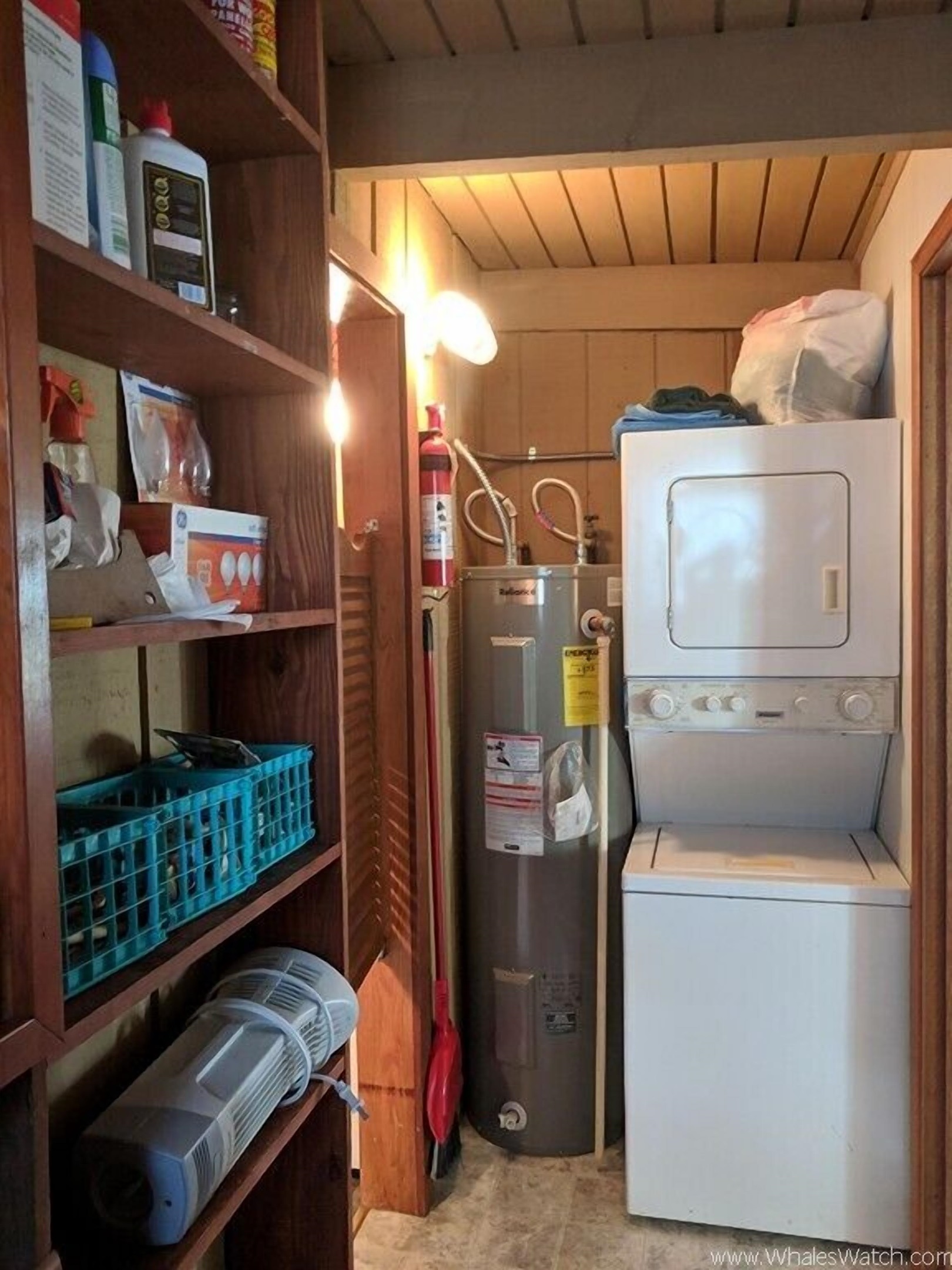utility room between living room & Kitchen