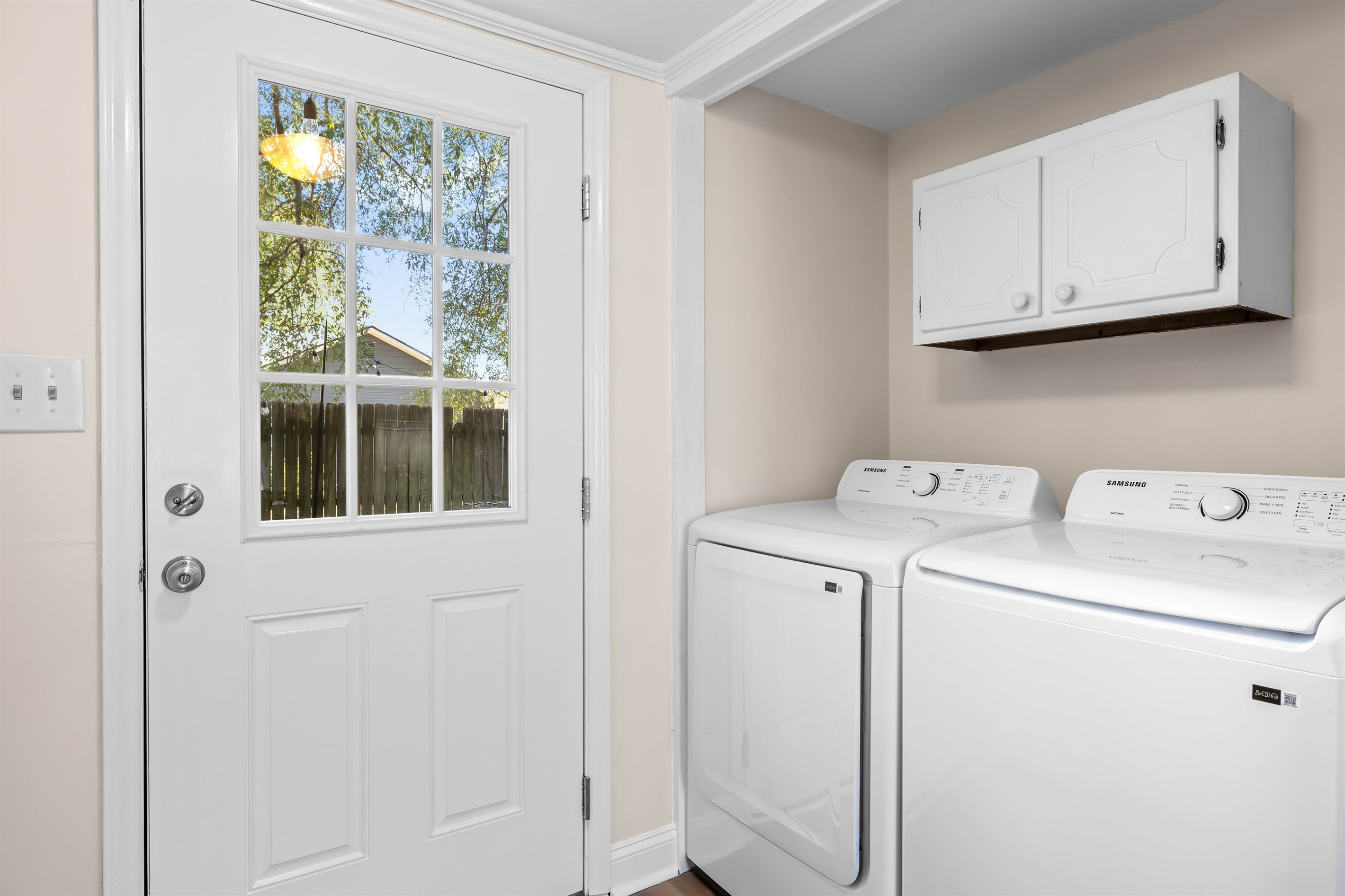 Laundry space off of the living room