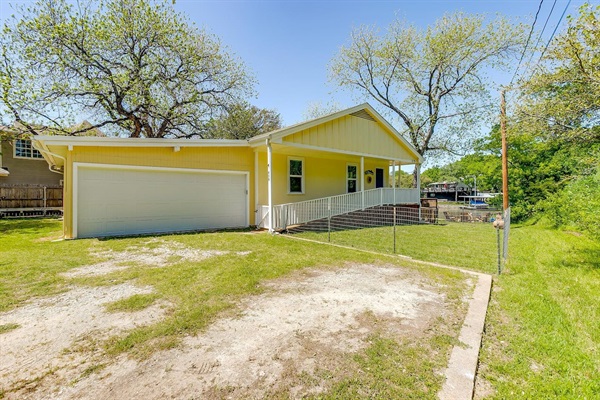 Driveway parking with room for multiple vehicles — convenient for families and boat trailers.