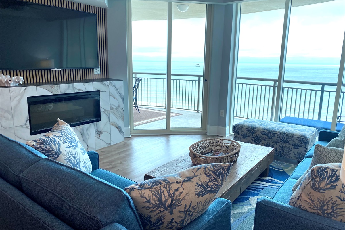 Living Room with TV & Fireplace