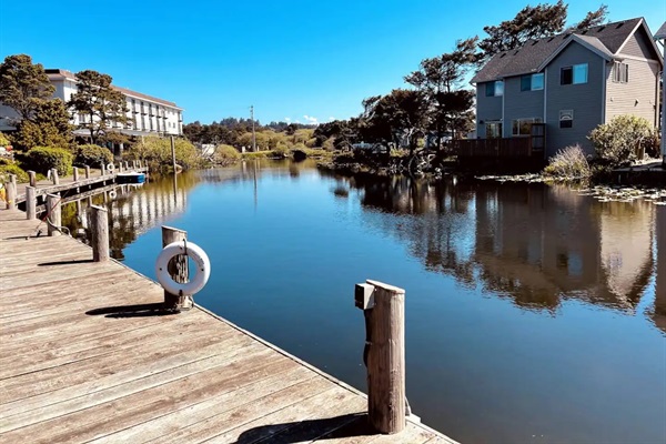 View of the Beach House from across the Devil's Lake Canal and just 2 blocks to miles of sandy ocean beaches. Coastal convenience with souvenirs, ice cream and fudge around the corner and a quick walk to many more local shops and restaurants! 