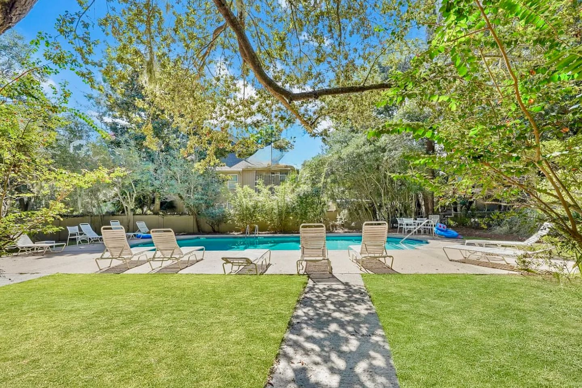 Pool lawn with lounge chairs