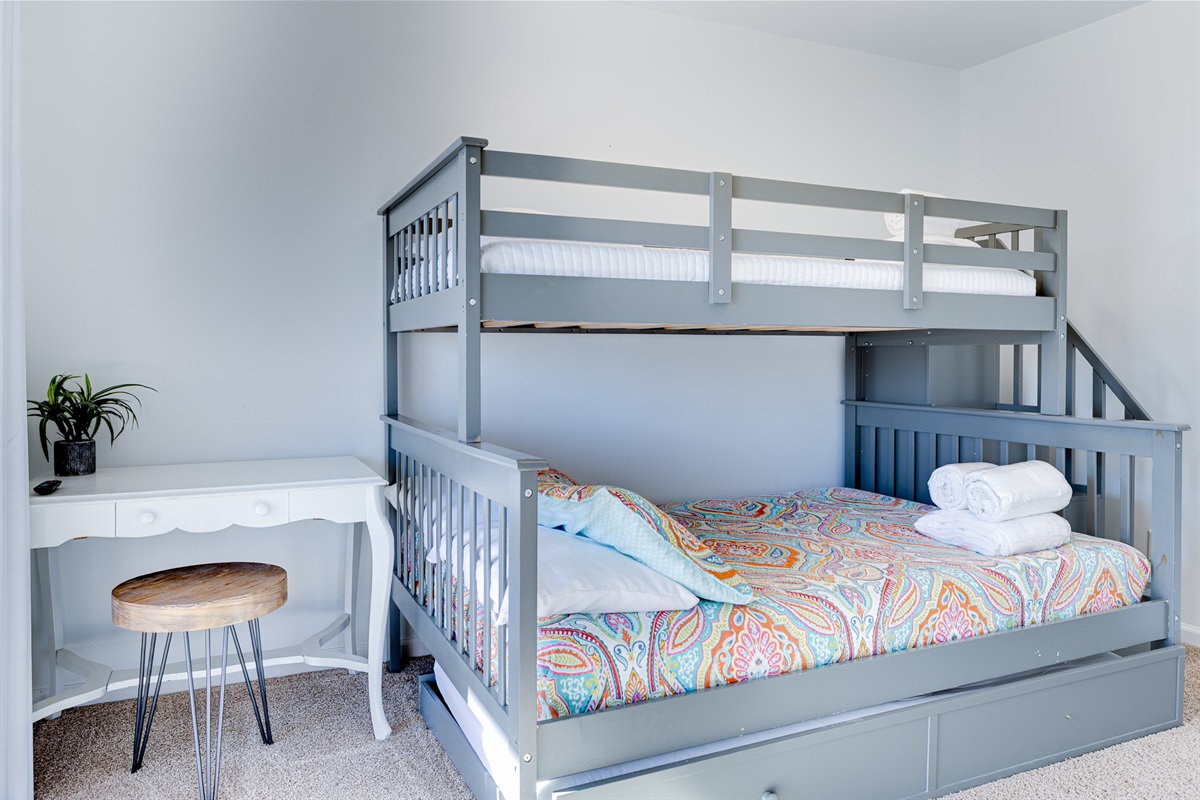 Kid-friendly bunk room with plenty of space to play: comfortable, safe, and perfect for little ones to call their own