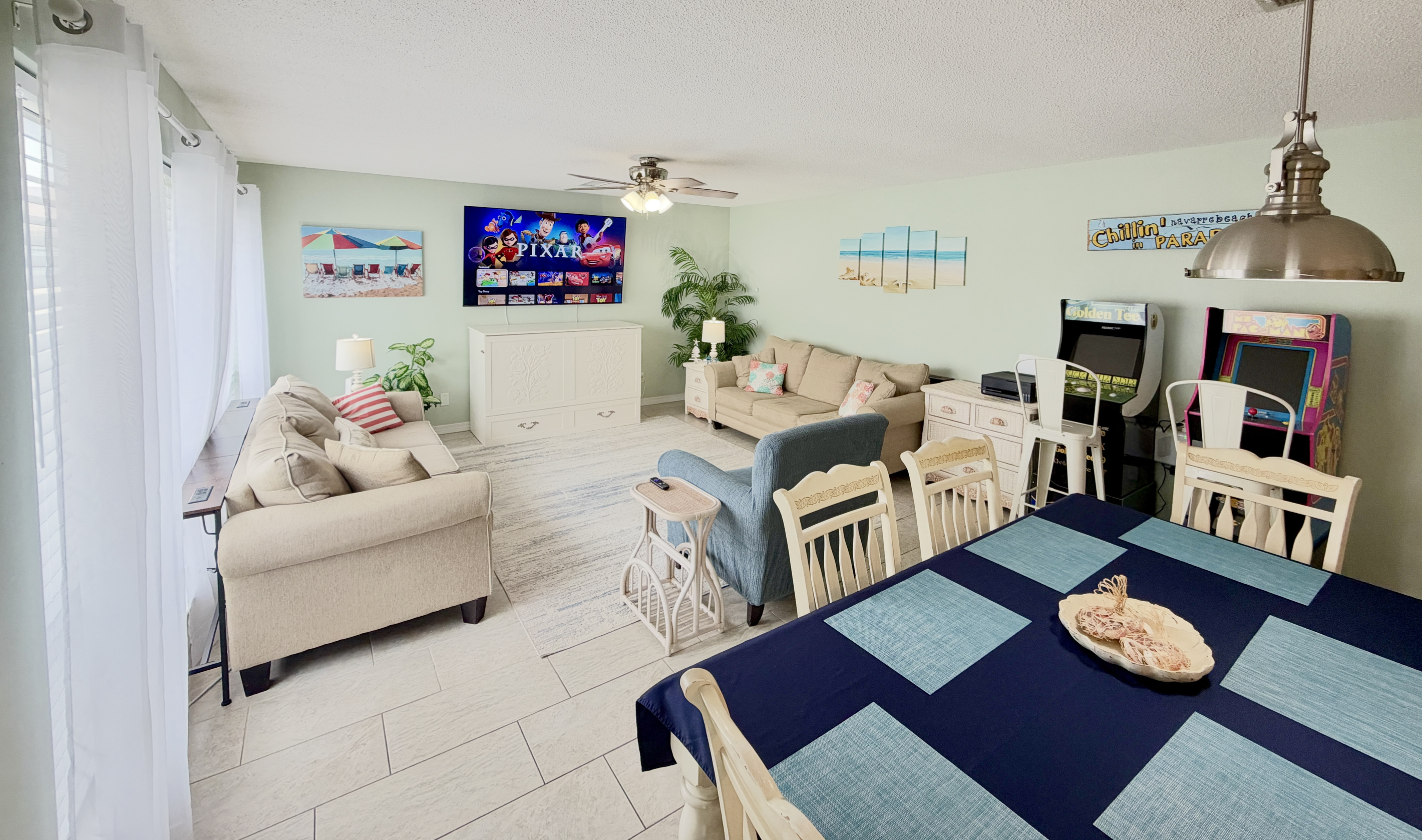 Bright, airy, and comfortable grand room with seating for the whole group to relax. Perfect for movie nights, family game nights, or simply unwinding after the beach.