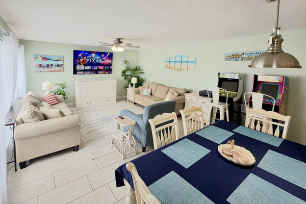 Bright, airy, and comfortable grand room with seating for the whole group to relax. Perfect for movie nights, family game nights, or simply unwinding after the beach.