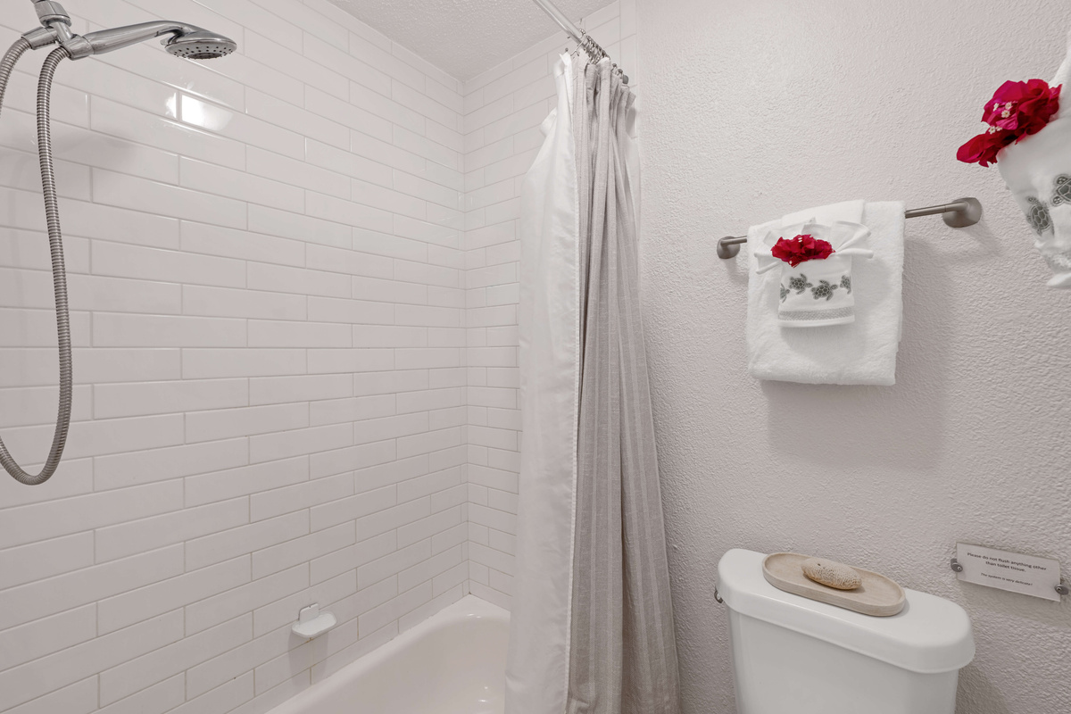 Clean, modern shower designed for a comfortable and relaxing stay.