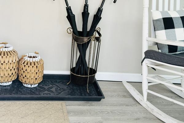 Mudroom storage for umbrellas, shoes, and other outdoor items.