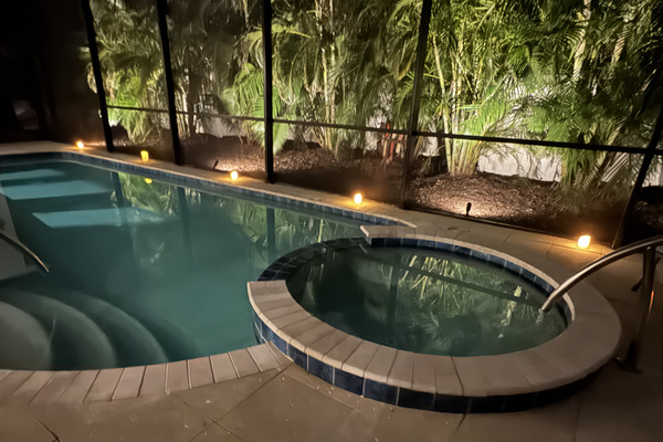 Uplighting sets the mood for a perfect night swim and therapeutic soak