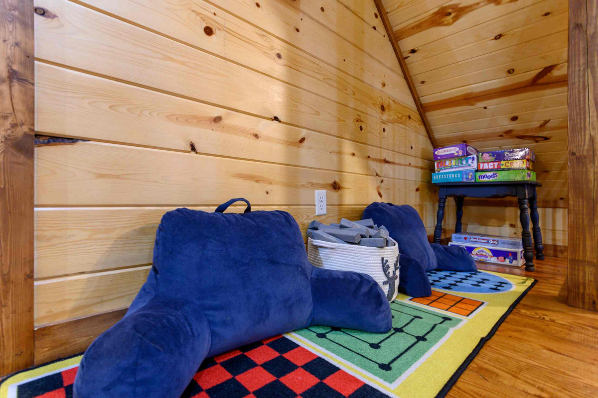 Playroom Retreat: Perfect for family fun with plush seating and games galore! Enjoy playful evenings!