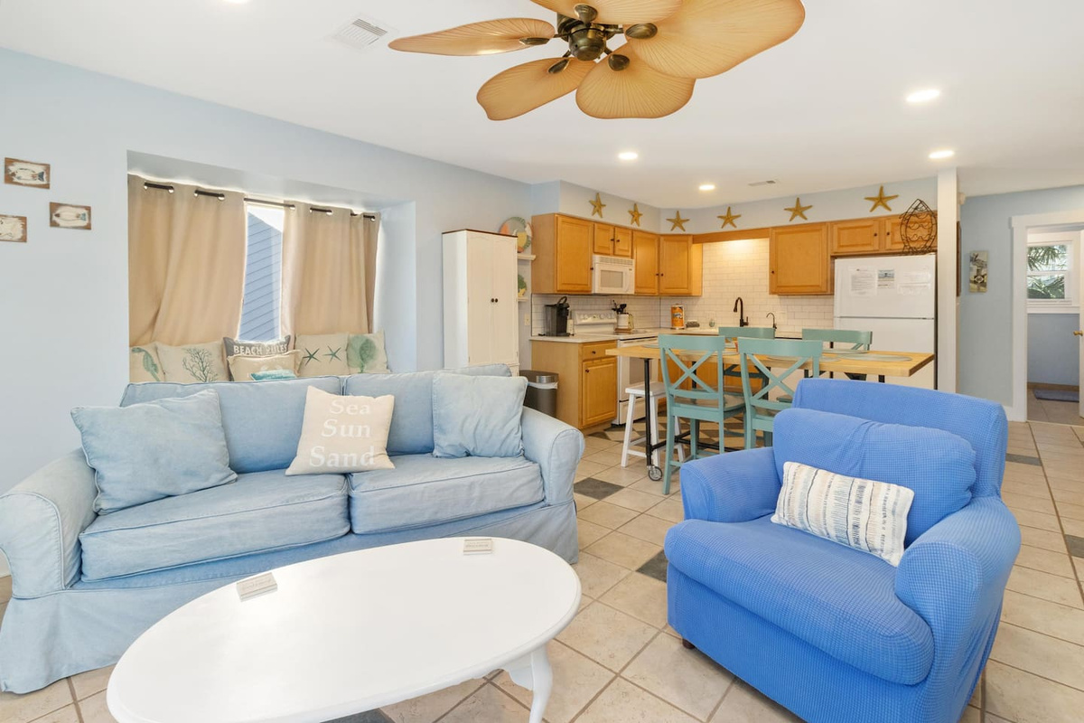 Your open-plan main level keeps the cook connected to the crowd &mdash; kitchen and living flow together the way vacation homes should.