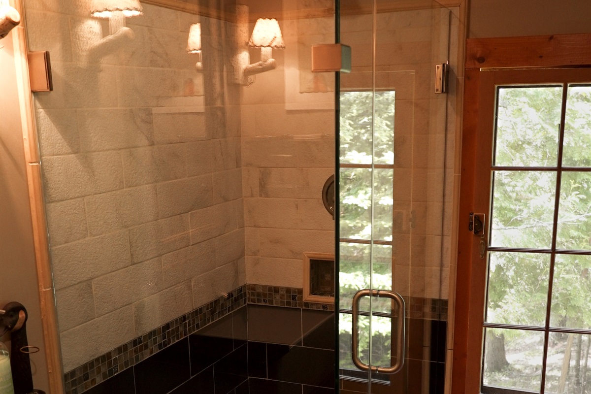 Full bathroom with shower upstairs in the lodge.