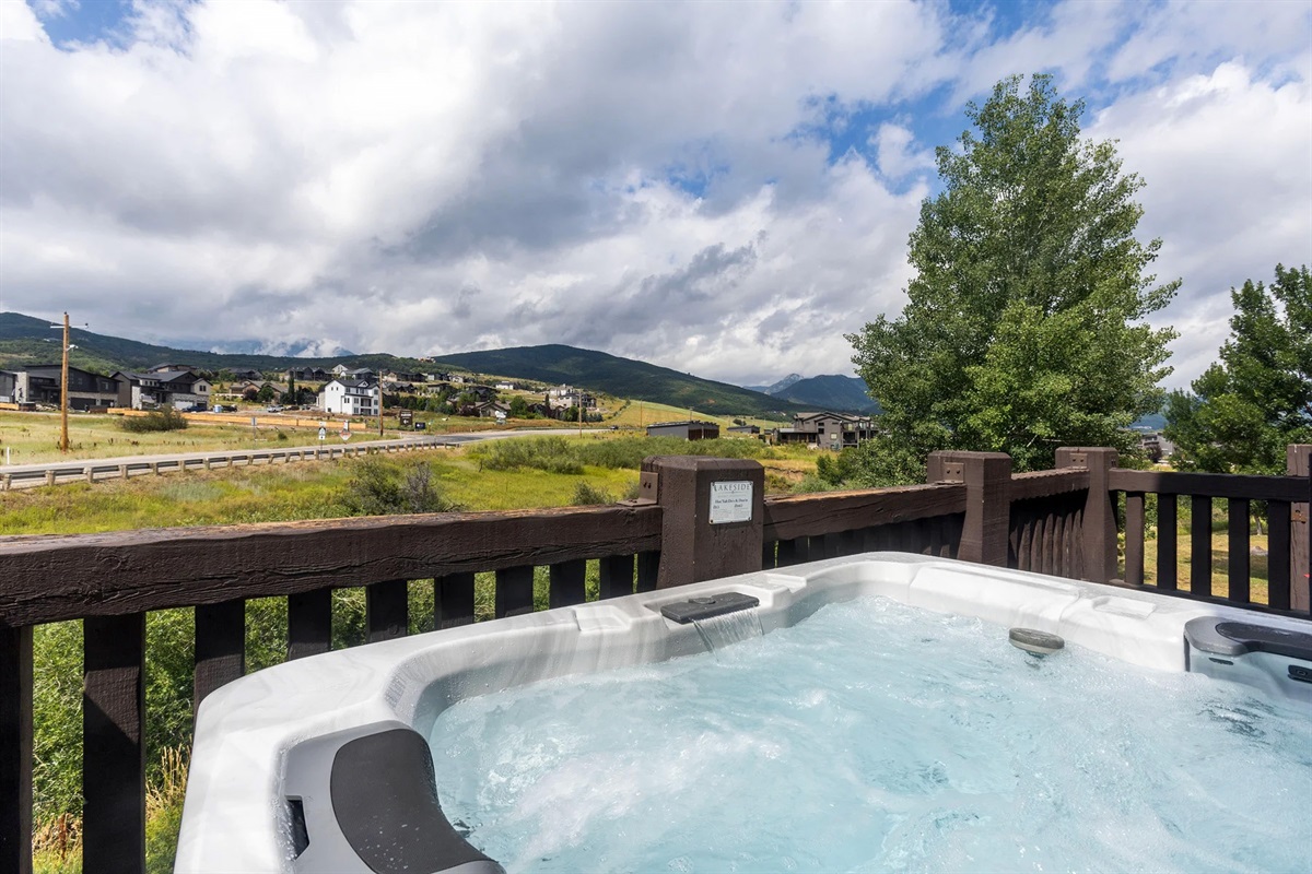 Relax in your private hot tub while soaking in sweeping views of the surrounding mountains and valley.
