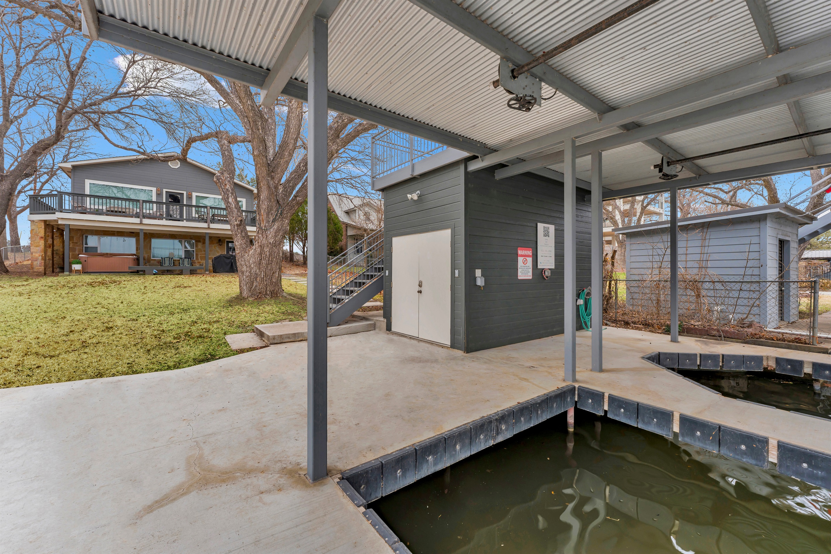 Water view of the house and boat dock 
