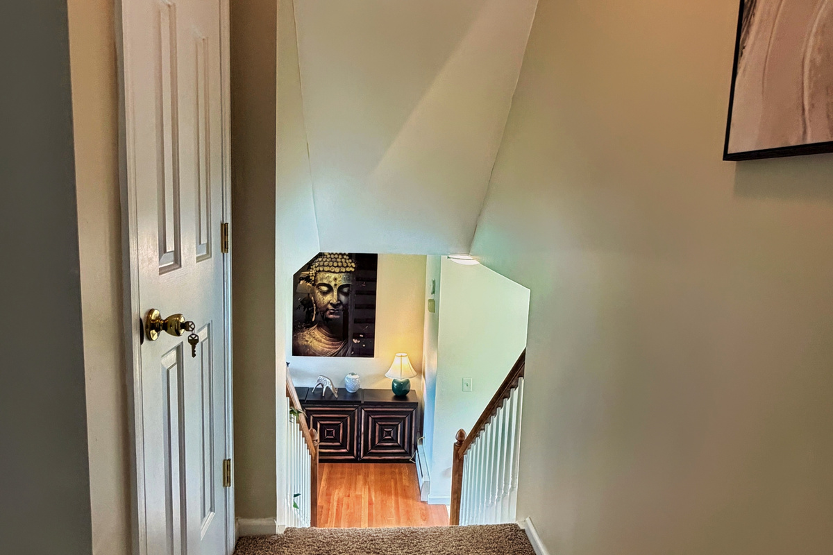 Stairs from 2bd floor going down to the 1st.