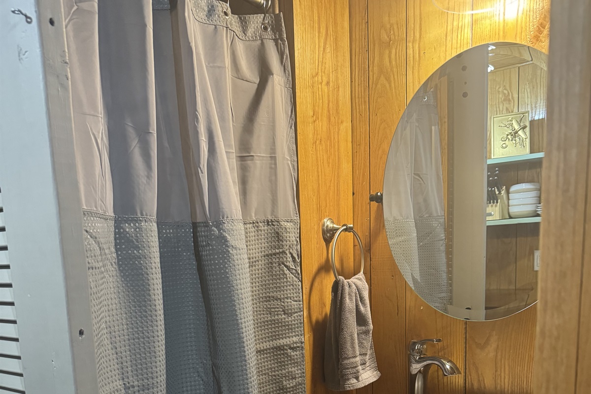 Step into a generously sized stand-up shower for ultimate relaxation.