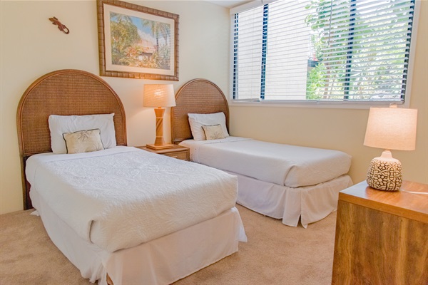 Guest room with two twin beds.