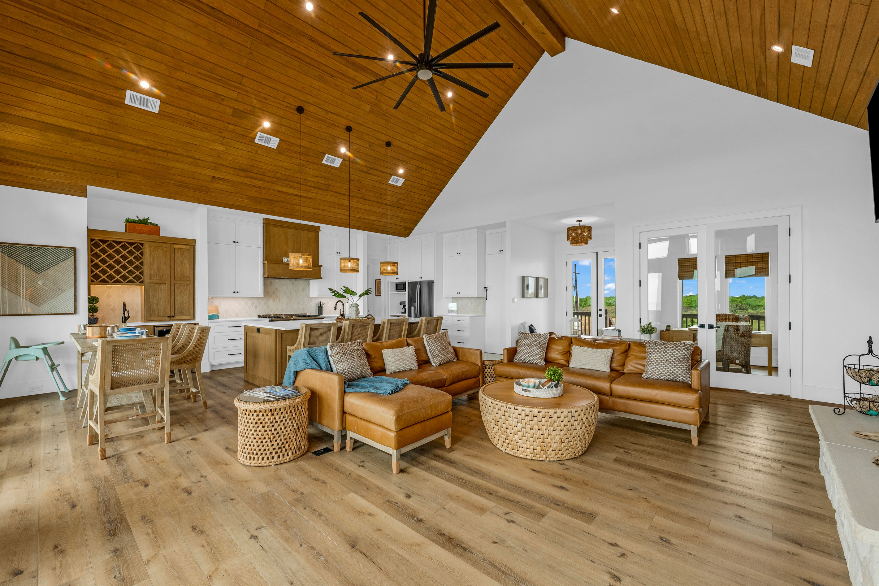 Cair Paravel: Open-concept living at its best: the great room flows straight into the kitchen and dining area, so nobody's ever cooking alone.