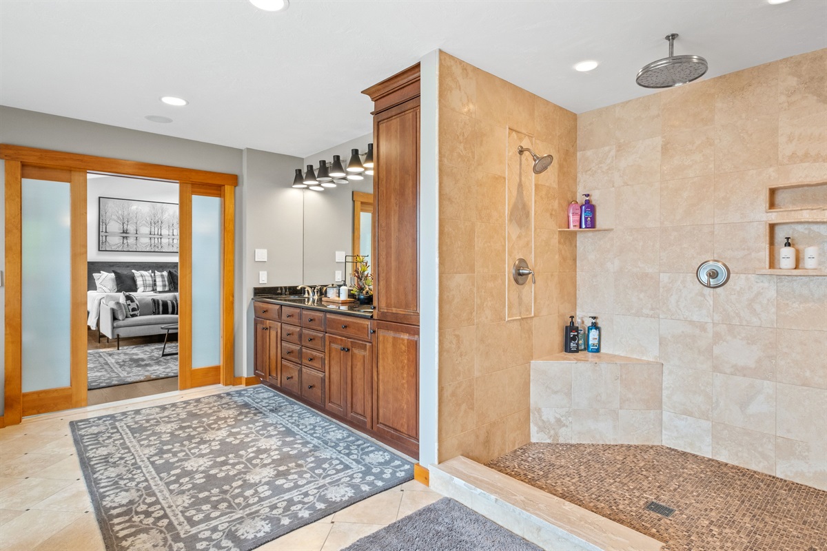 Second floor master bathroom with Lake Winnipesaukee views soaking, tub and walk in shower