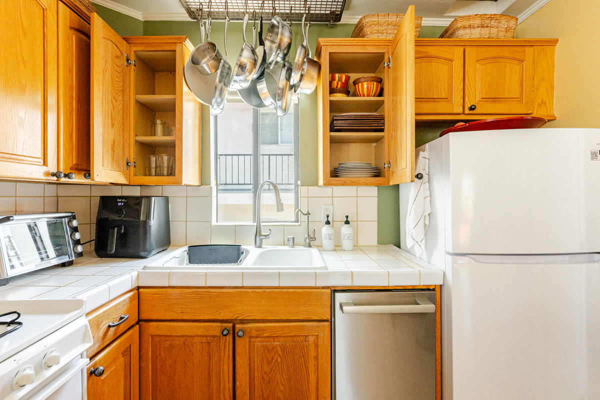 Kitchen sink includes Everpure water filter.  All cabinets are filled with a variety of plates, bowls, glasses, tupperware, pots and pans, blender, etc. Everything needed to cook a fabulous meal!