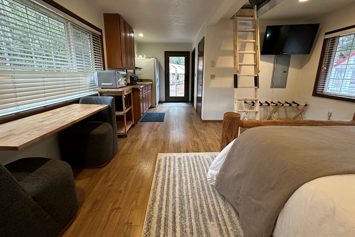 Welcome to the Barn!  Located just a few steps from the main house, the Barn is a perfect place for those that need their own space.  It has a queen bed, 3/4 bath and kitchenette and a loft with 4 singlebeds. The downstairs is fully ADA accessible! 