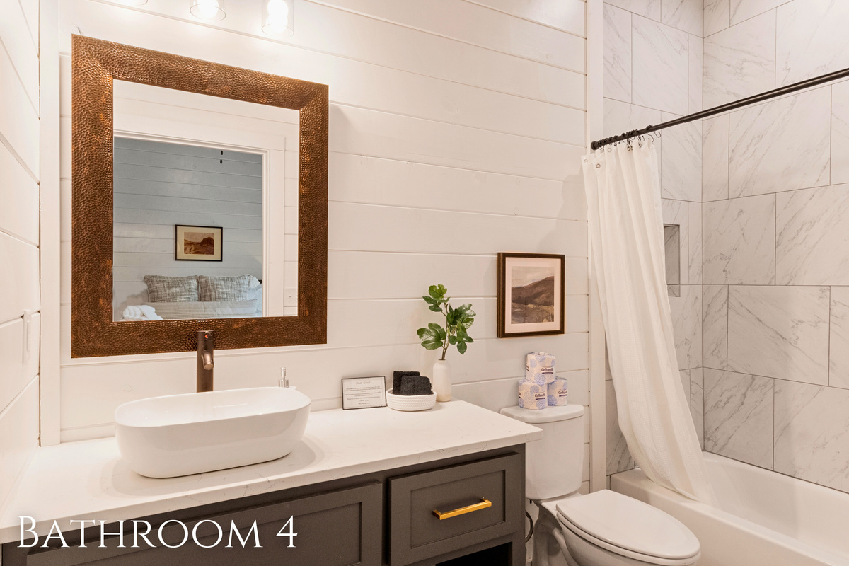 Sleek and sophisticated, this bathroom offers a clean and contemporary space to rejuvenate.