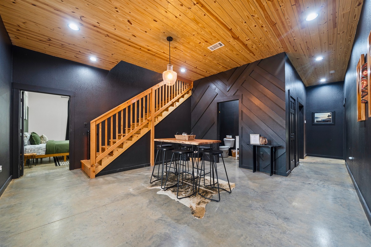 As you step inside, you&rsquo;re welcomed by soaring ceilings, rich wood accents, and an open layout that immediately makes the space feel both grand and inviting.