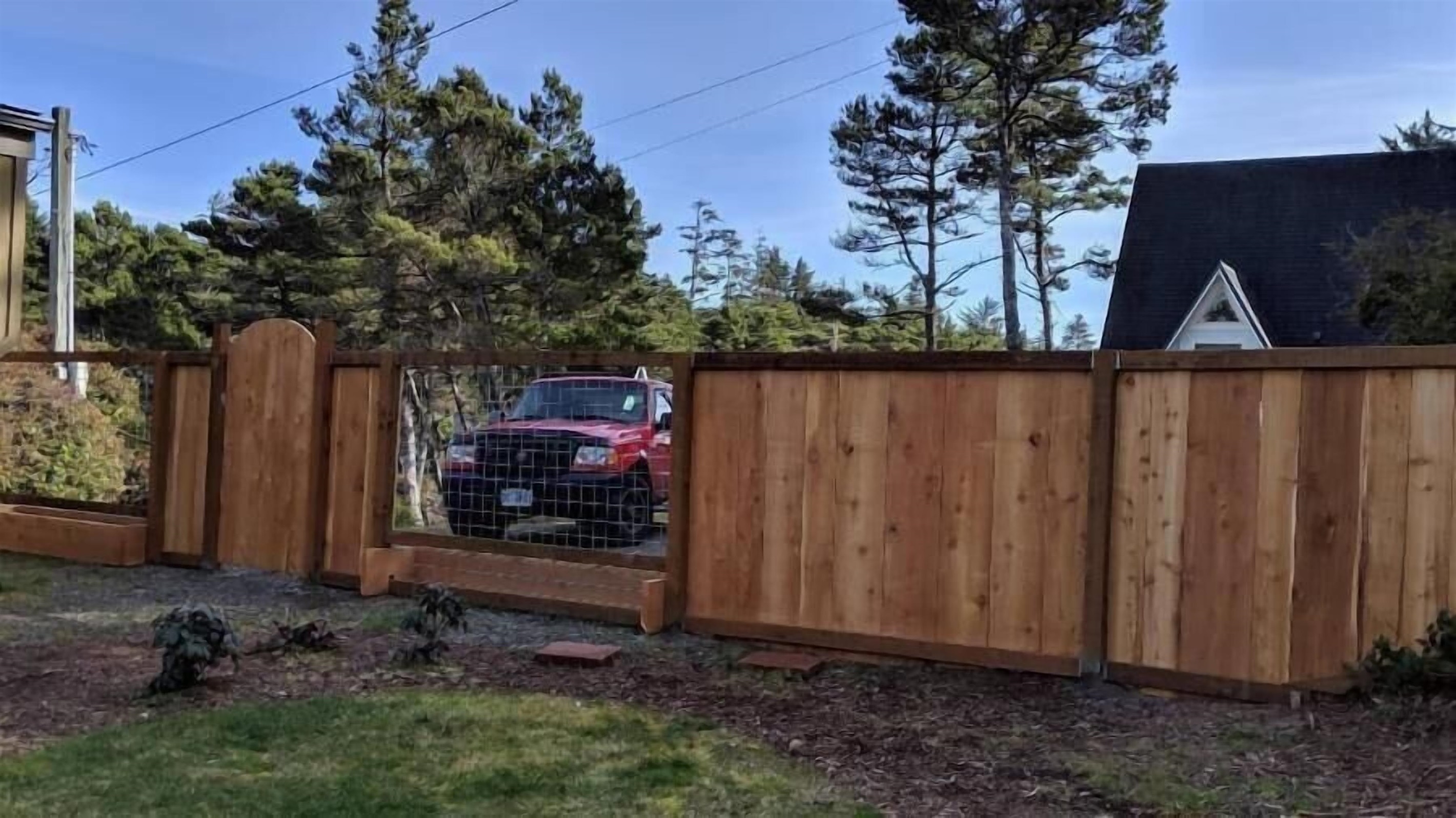 parking for 2 cars on other side of fence