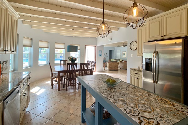 Full Sized Kitchen with full sized refrigerator and wine refrigerator.