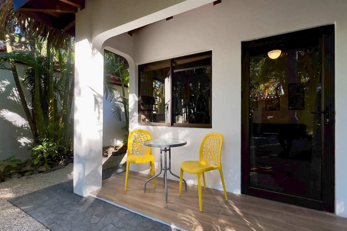 Outdoor patio is perfect for coffee in the morning.