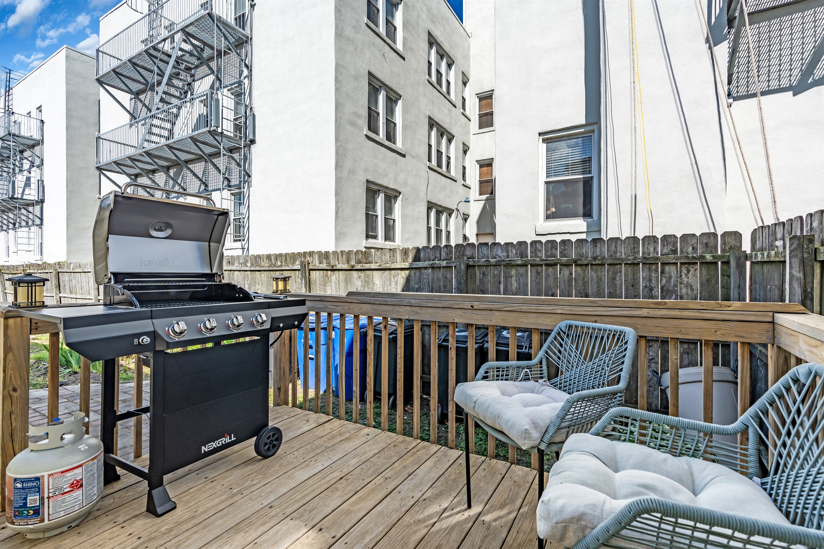 Outdoor propane grill with chef and assistant seating while you grill for the crew!