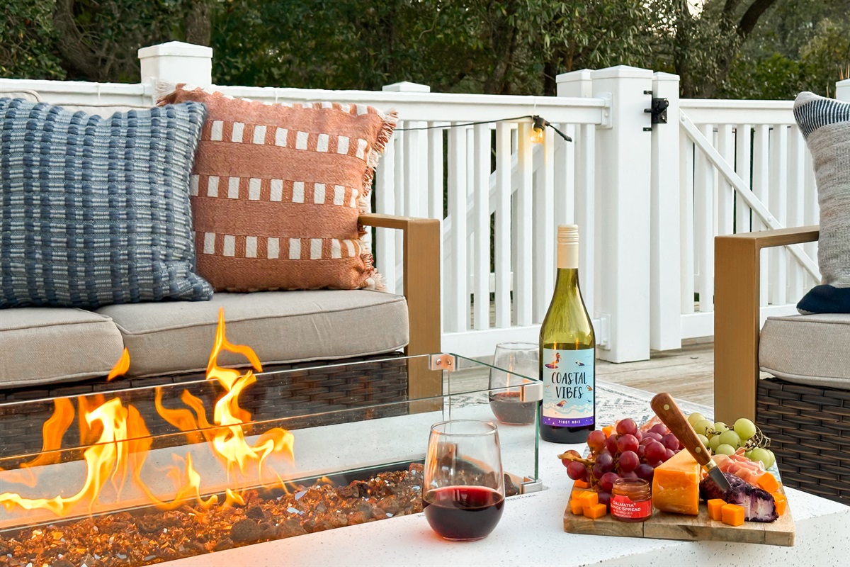 And a large, sunset-facing upper deck with a fire table.