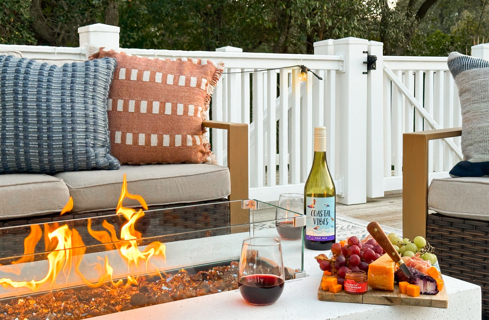 And a large, sunset-facing upper deck with a fire table.