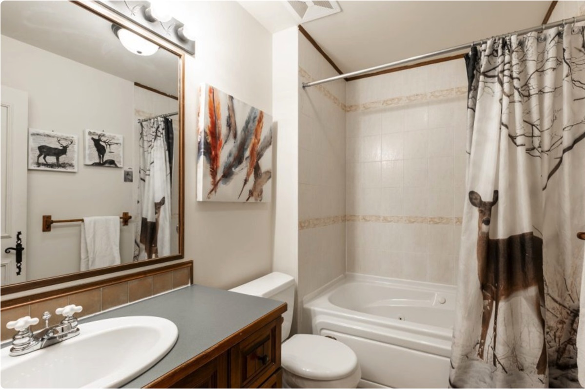 Master bath with tub and heated floors