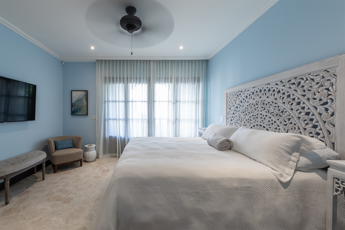 Primary bedroom with king size bed.