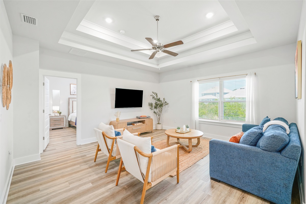 Gather, relax, and enjoy the bright and cozy living area during your stay