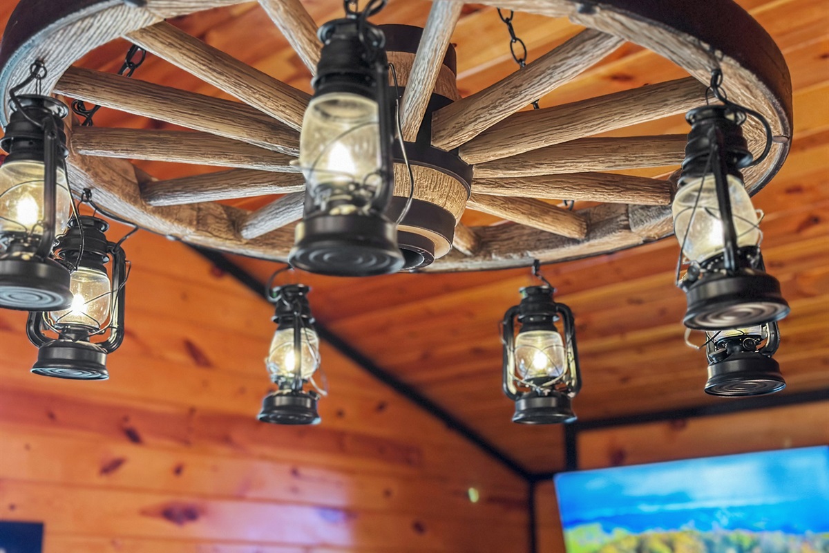 This lantern chandelier is the cherry on top of this exquisitely decorated cabin. A great deal of time and effort was spent to bring this modern cabin together. Please take notice of the decor.