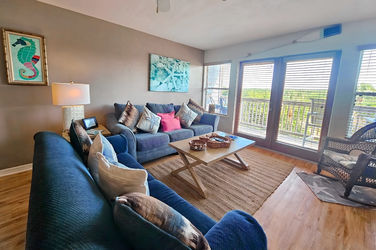 Spacious Living Room with Bright Open Windows