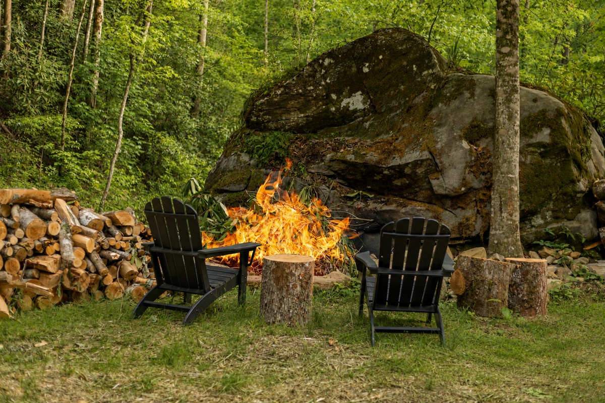 Gather around the fire pit for cozy evenings surrounded by nature and the sounds of the nearby stream.