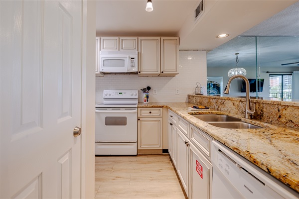 Kitchen area with all appliances, large and small