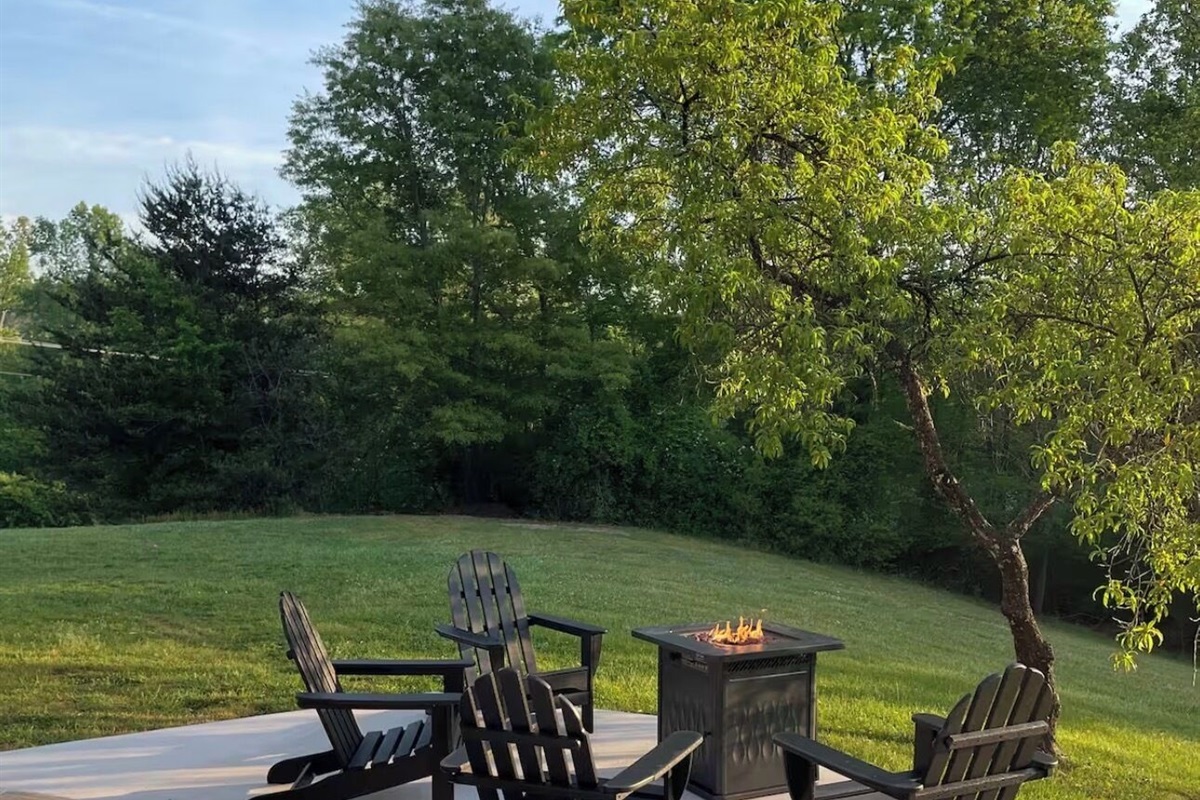 The back patio with large backyard is perfect for your group