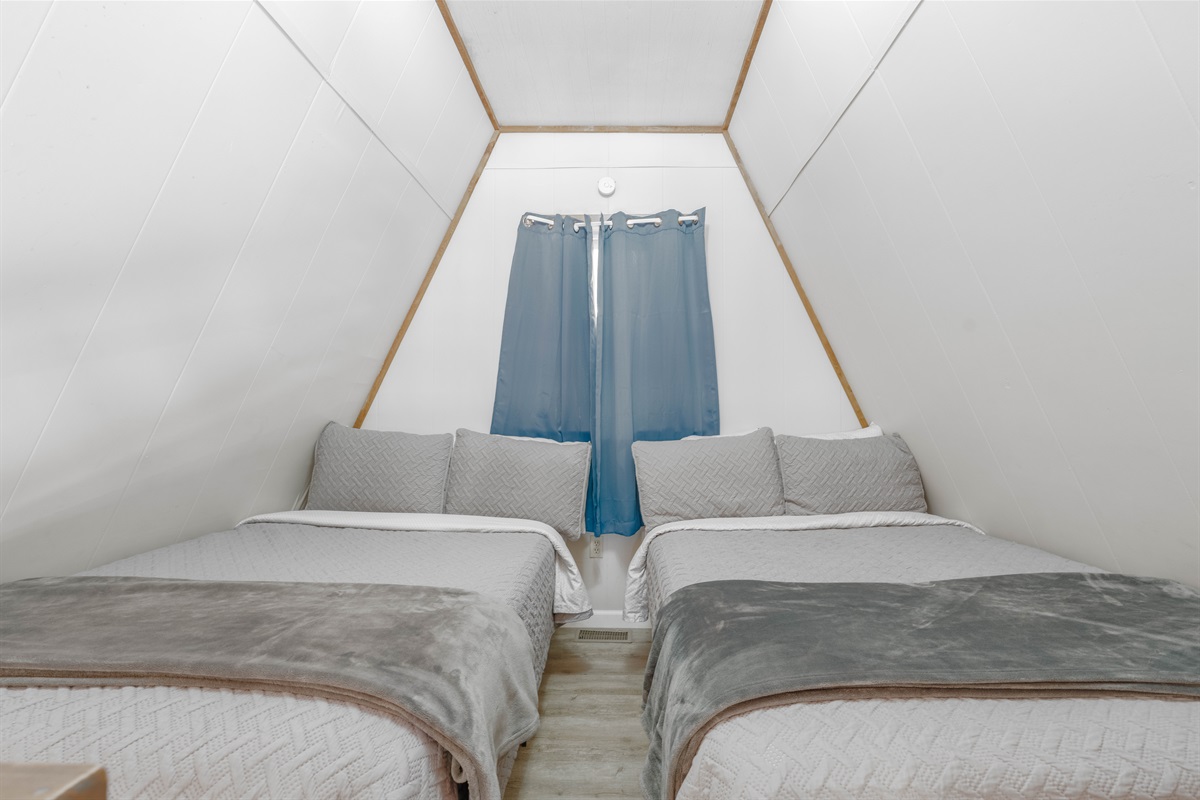 Two full size beds on loft level