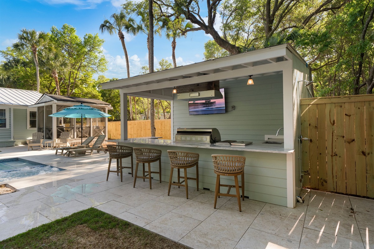 Outdoor Kitchen And Bar With Gourmet Grill, Beer and Wine Fridge, Ice Maker, and 65" Smart TV | IOP Escapes Beach Blessing | 3705 Hartnett Blvd, Isle of Palms, SC